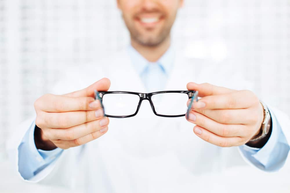 A man getting new glasses from our VSP eye doctor near Nashville, Tennessee