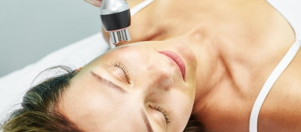 A Woman getting RF Treatments for her face at our Nashville Eye Doctor