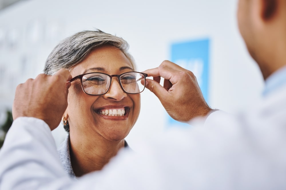 Woman getting eyeglass frames from our optometrist in Nashville