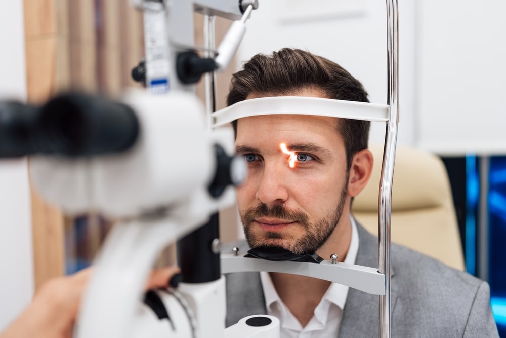 A man getting an eye exam from our optometrist in Nashville