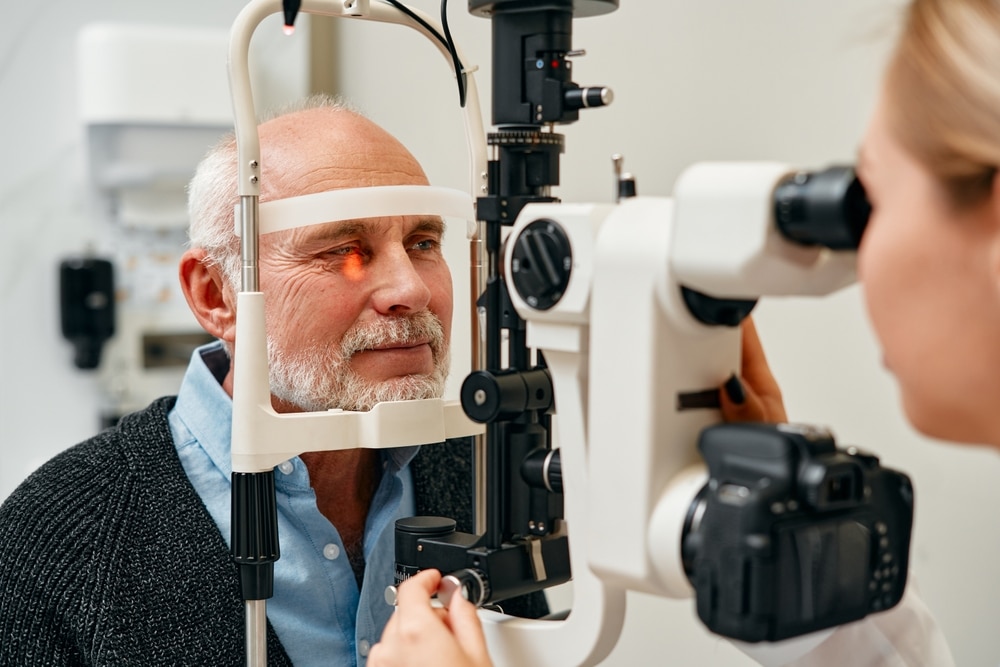 Man getting comprehensive eye exams from the leading Nashville eye doctor