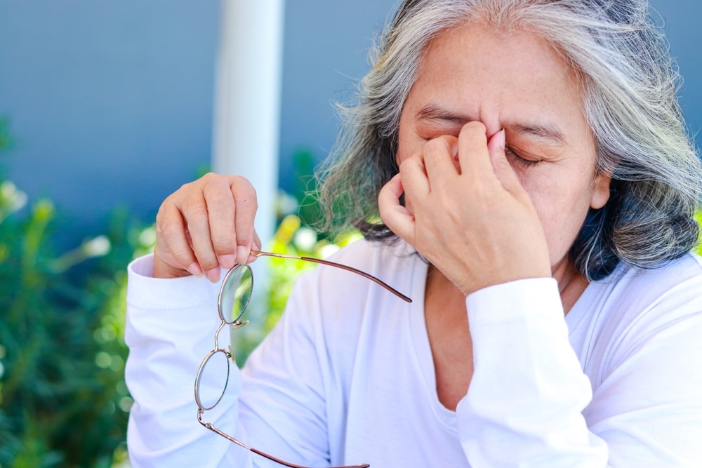 woman struggling with diabetes and eyesight strain