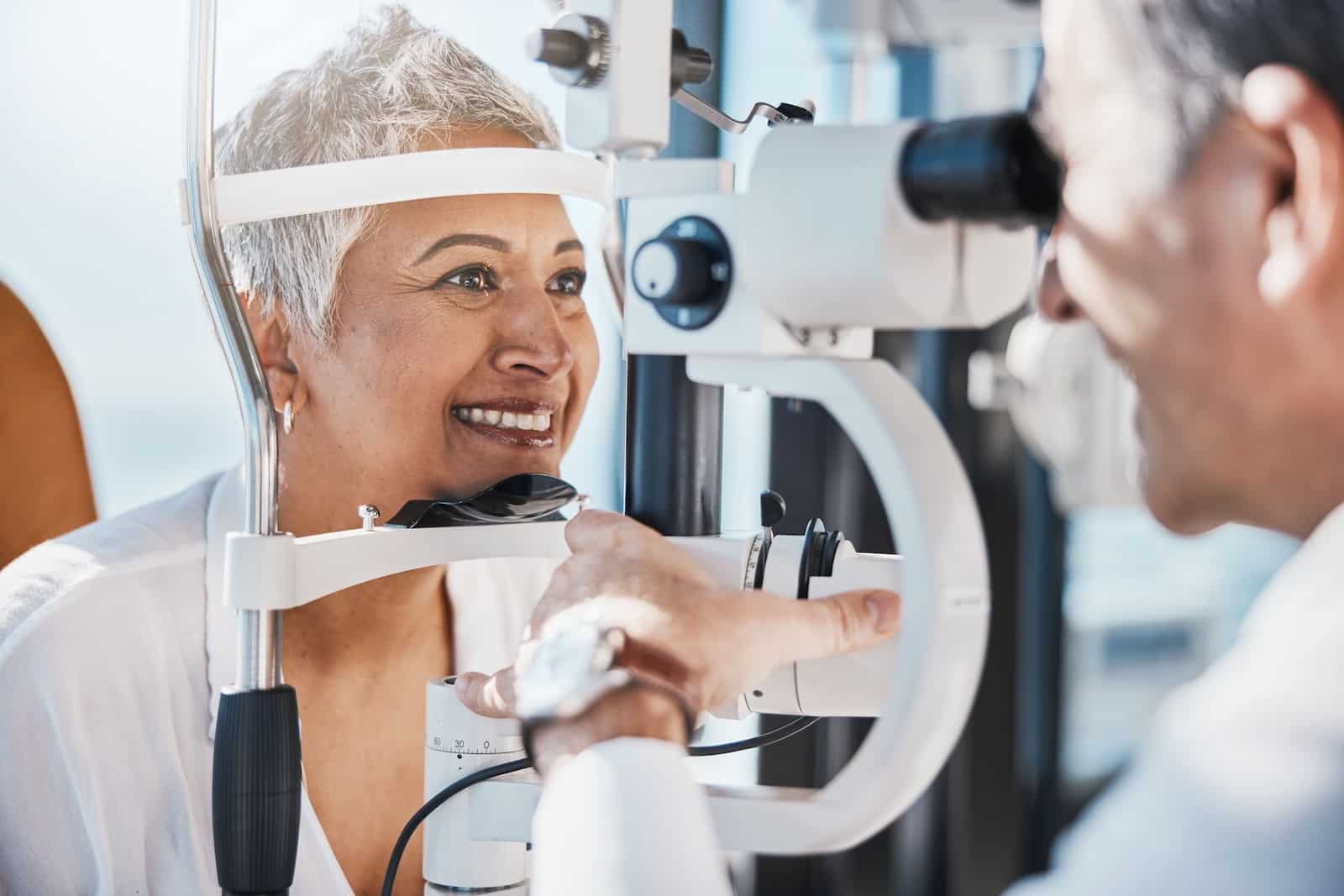 Where to Buy Designer Prescription Eyeglasses in Nashville 2 Woman getting a comprehensive eye exam with an optometrist