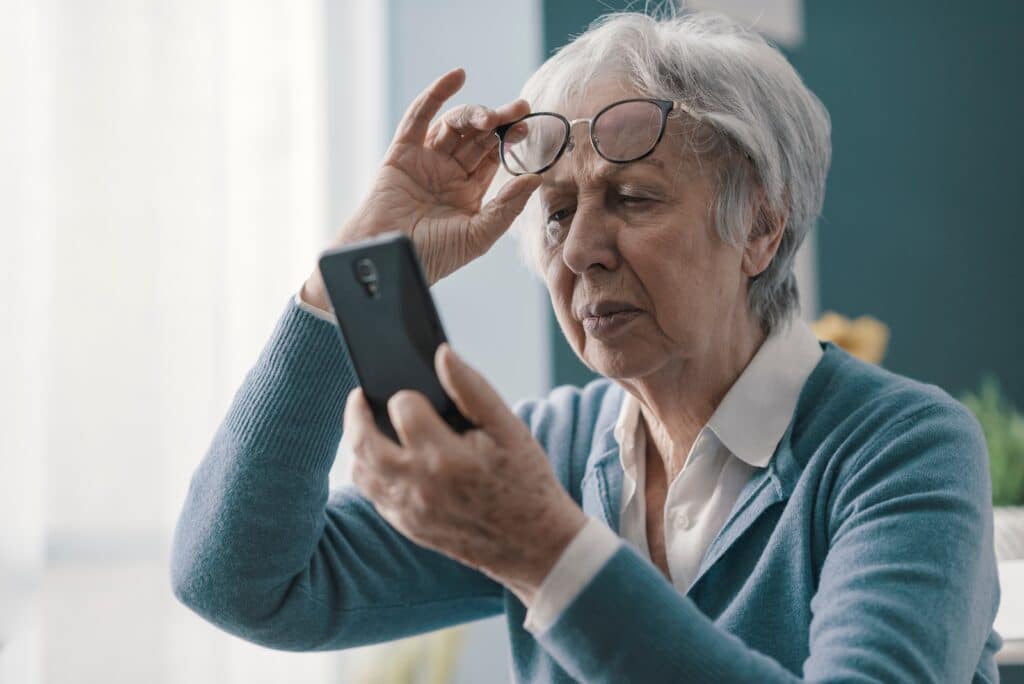 Woman experiencing vision issues that could be from eye diseases like age related macular degeneration